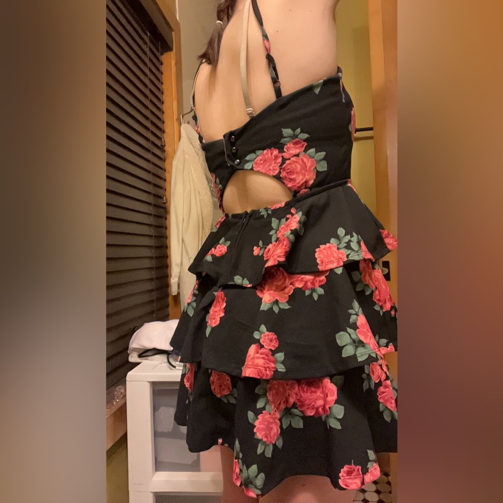 I got it from Ross. It is a size medium. It’s black with pink roses